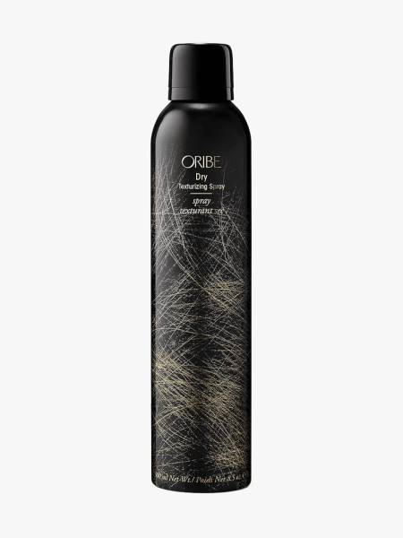 Oribe Dry Texture Spray in branded component on a light gray background